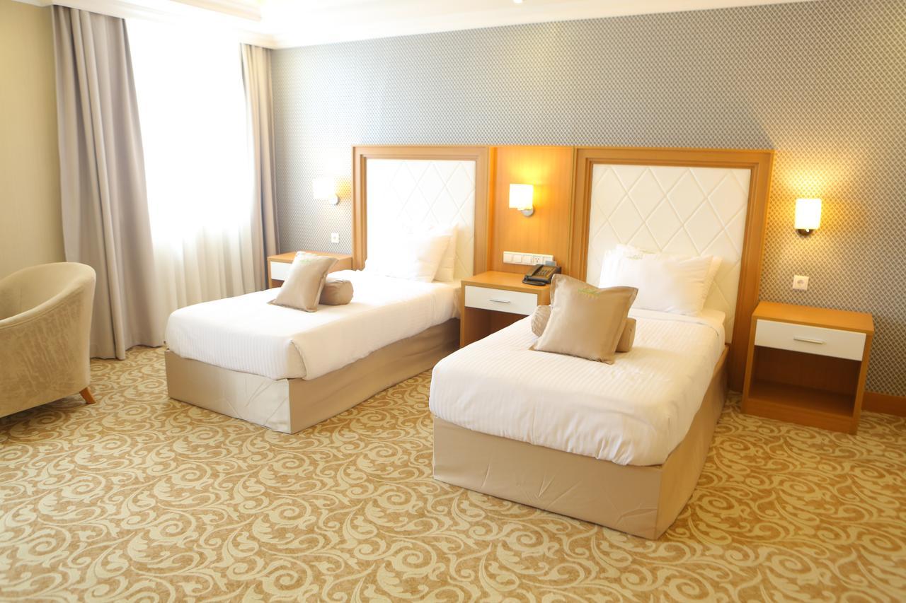 Momona Hotel Аддис-Абеба Экстерьер фото